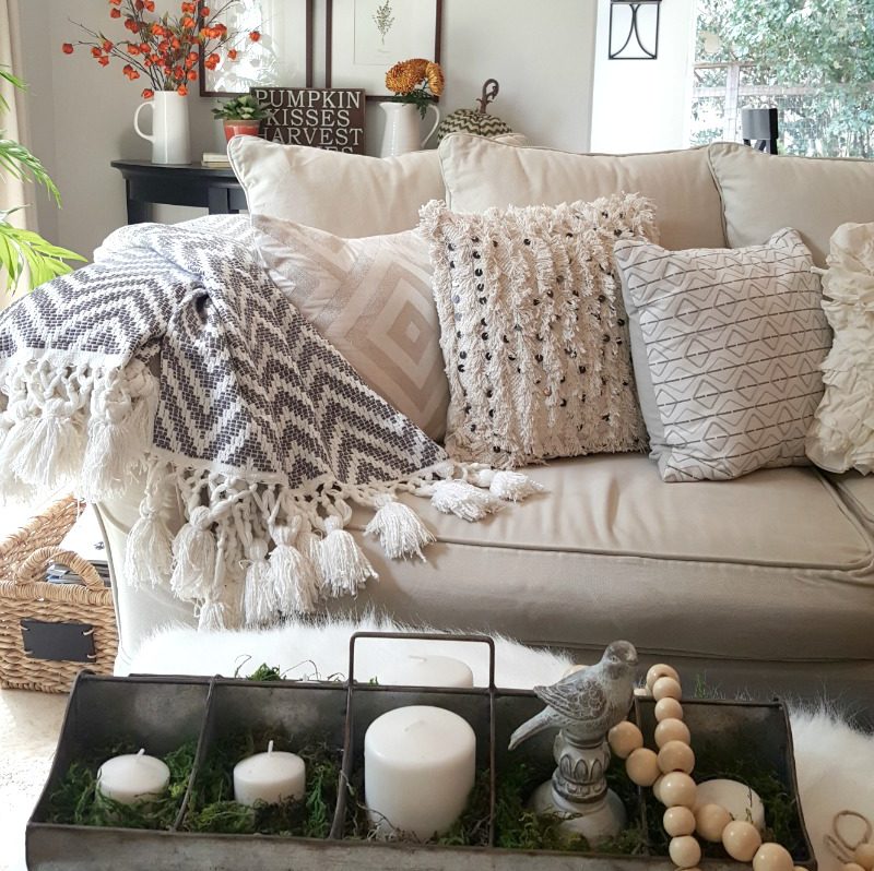 fall couch with textured pillows and throw