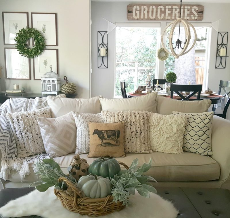 fall couch decorated with neutrals and soft greens