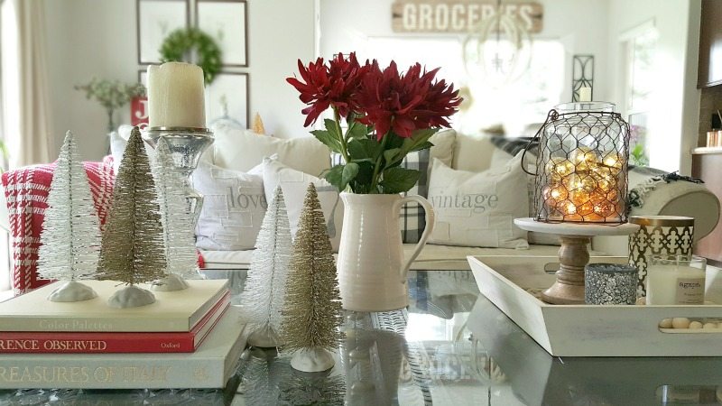 holiday coffee table decor ideas with mini trees and floral accents