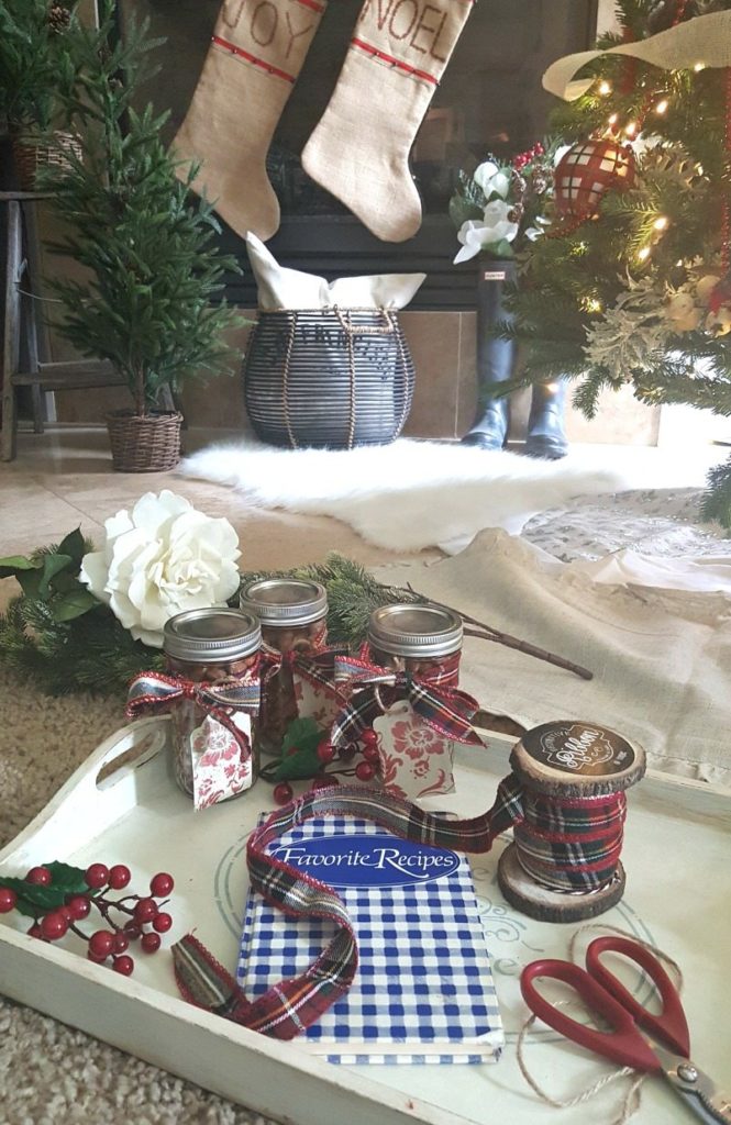 mason jars tied with plaid flannel ribbon and gift cards are perfect holiday gifts