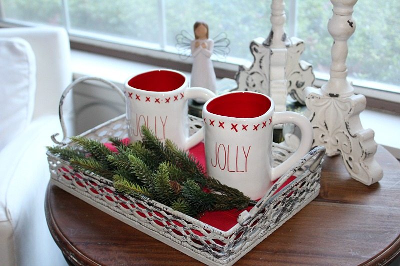 Holiday cozy bedroom vignette with holiday mugs