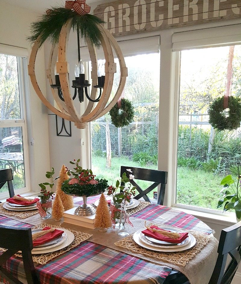 Festive Christmas table decor with rustic chandelier