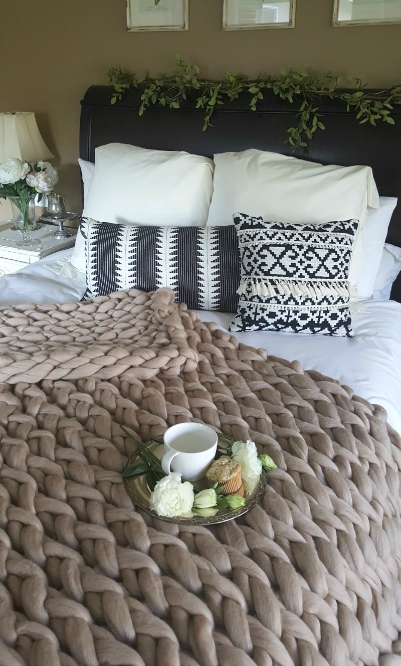 beautiful merino wool arm knit blanket creates unique bed