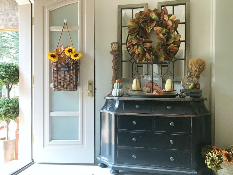 decorate for fall in your front entryway with sunflower door baskets and wreaths
