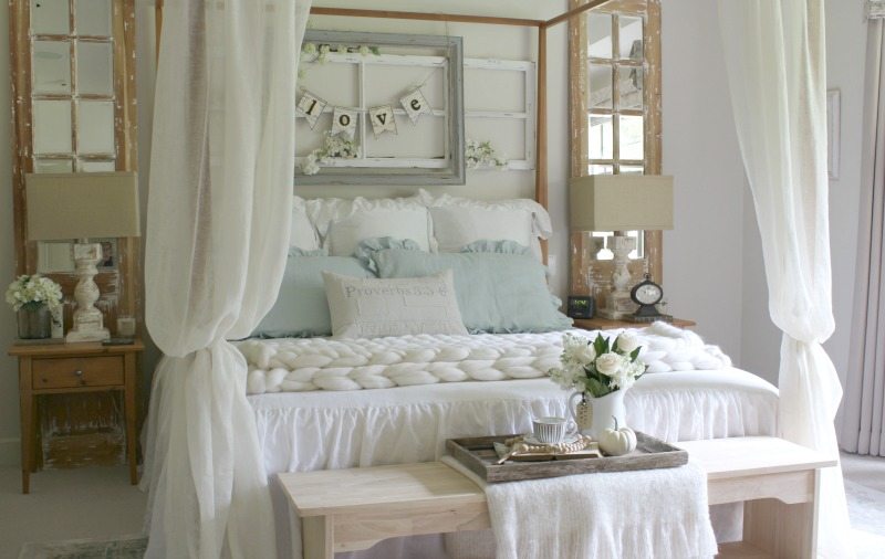 romantic master bedroom with white bedding 