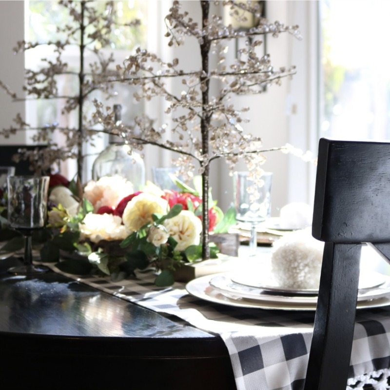 Holiday Tablescape with mini trees and and florals
