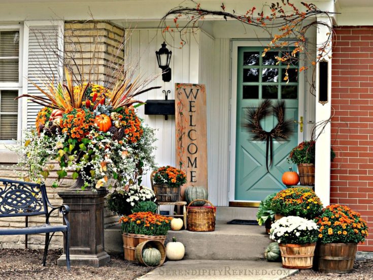 fall front porch with mums and festive decor 