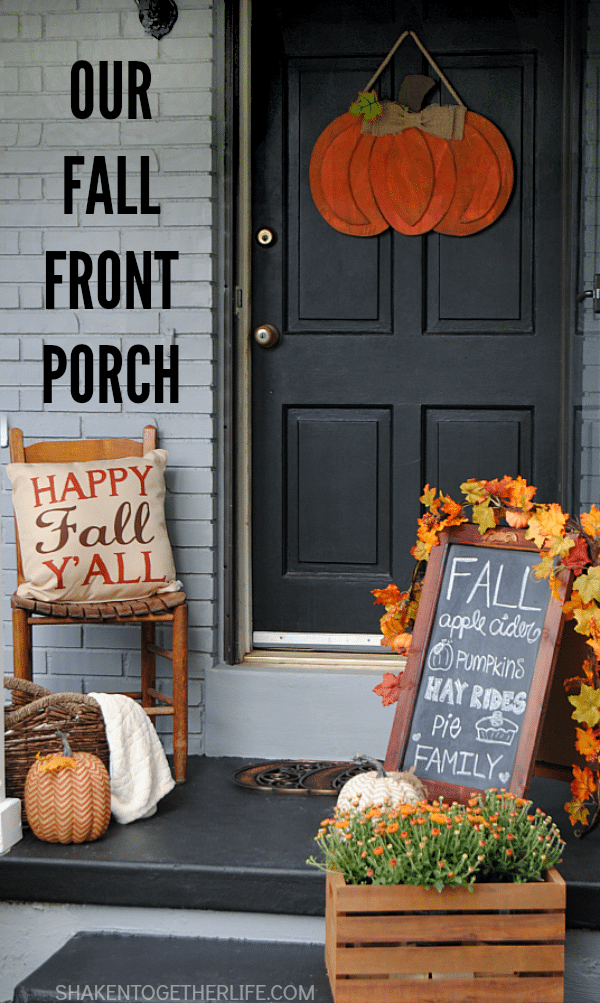 shaken together loife decorates front door with pumpkins and chalkboard