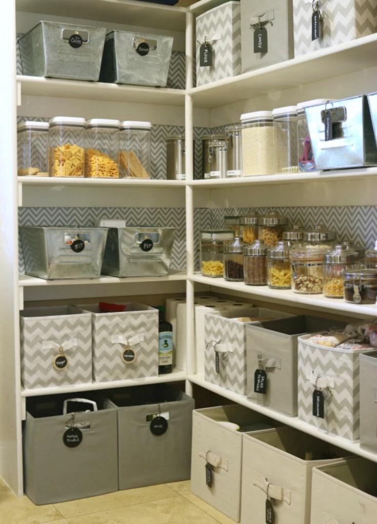 organized food bins on pantry shelves