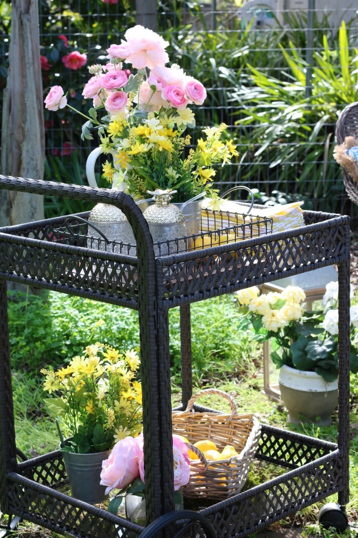 outdoor serving cart with spring flowers
