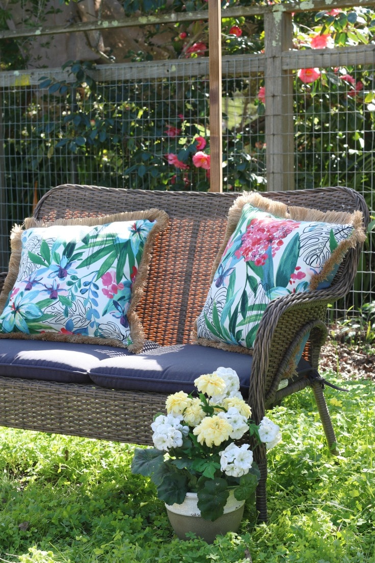 backyard wicker seating with spring pillows