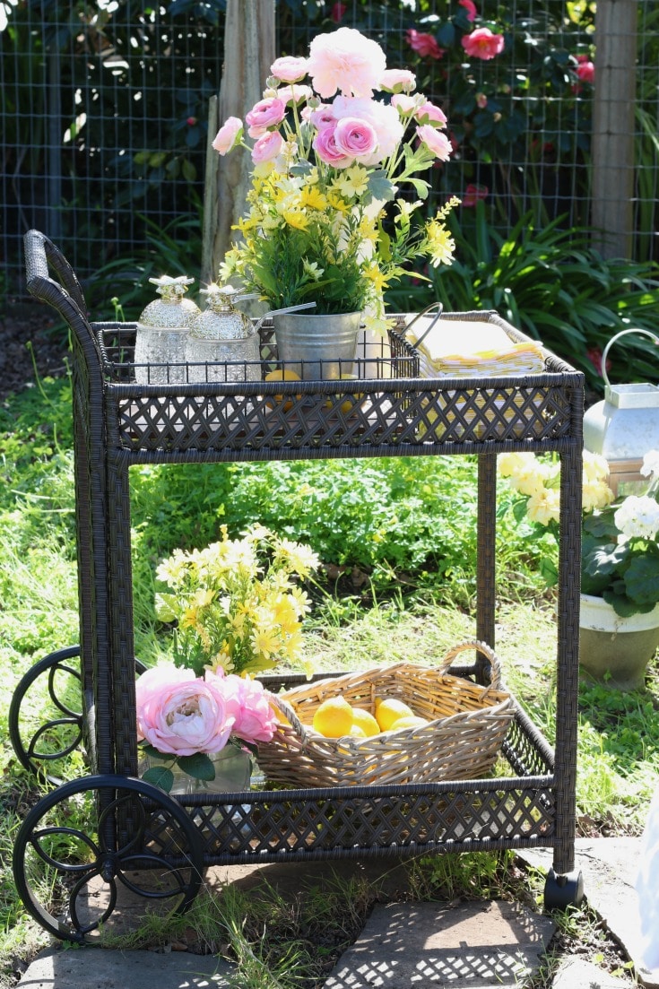 backyard outdoor garden party serving cart with flowers
