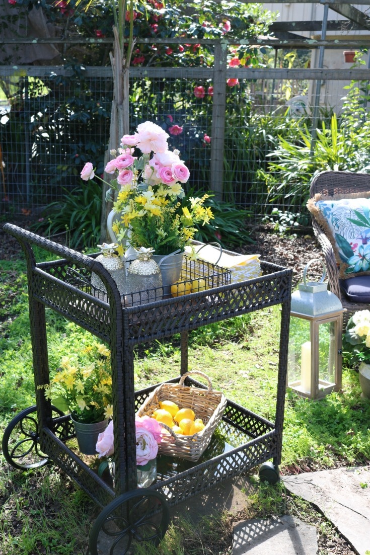 garden party serving cart with flowers