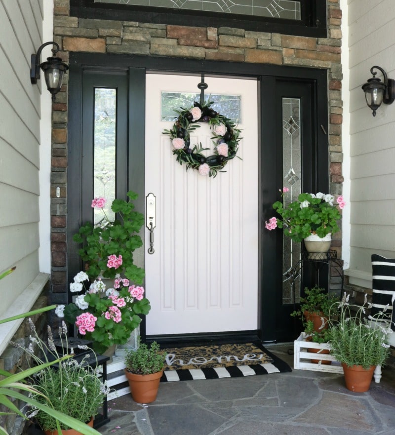 pink front door perfect for summer or spring decor