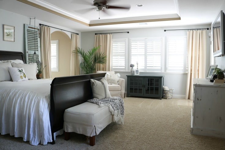 Master bedroom with diy drop cloth curtains