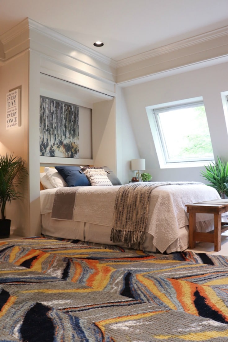 new rug and pillows spark joy in bedroom style makeover