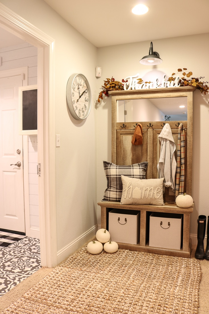 Farmhouse style entryway bench and storage unit solves all your entryway needs