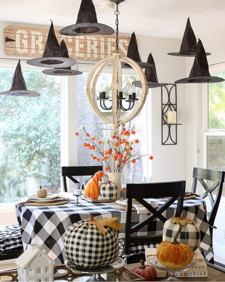 Easy and Affordable tips for a black & white and orange theme Halloween table. We are sharing our easy tips!