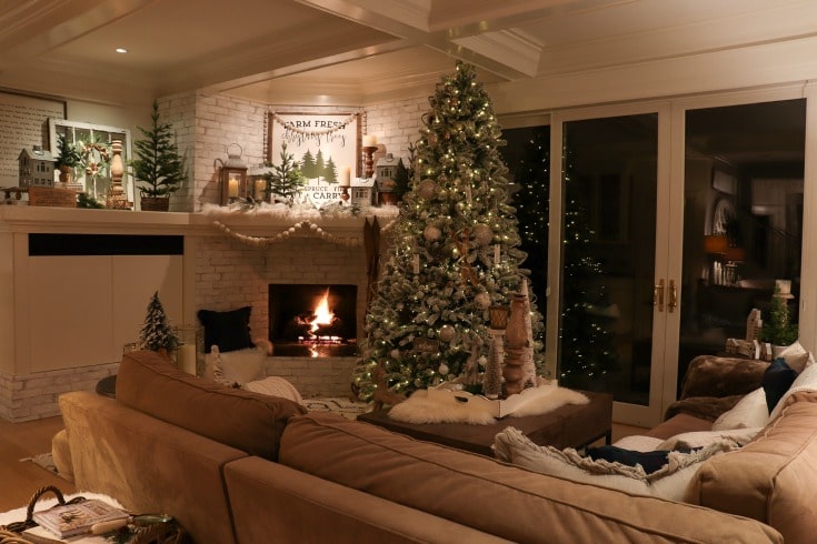 family room white Christmas themed holiday decor with farmhouse elements