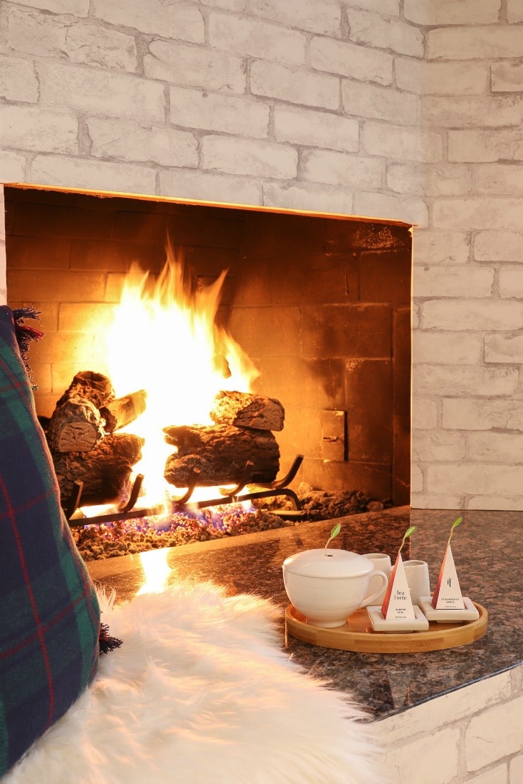 snuggle up by the fire with your hot cup of tea