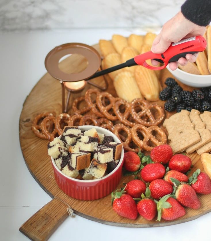 light the tea light under you bain marie fondue chocolate fondue chacuterie board pot to keep the melted chocolate warm and reading for dipping at all times