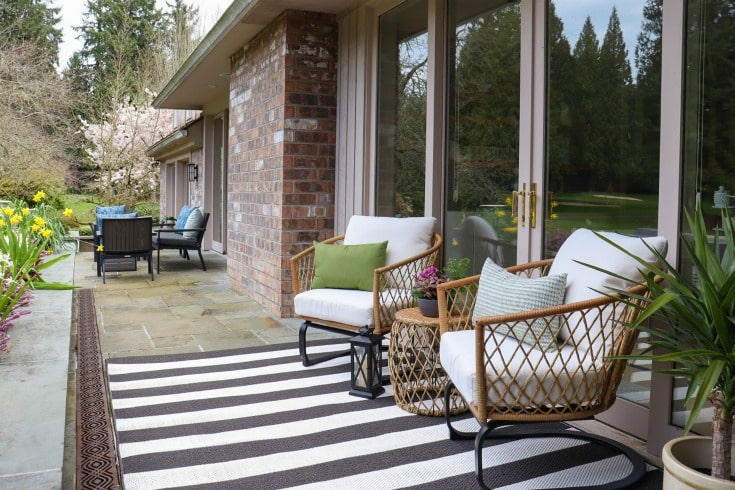 striped rug and two wicker chairs from better homes & gardens at walmart