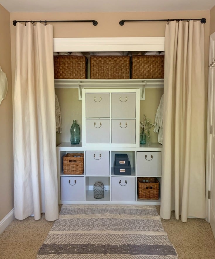 finished no door closet makeover organization using cube organizers and curtains