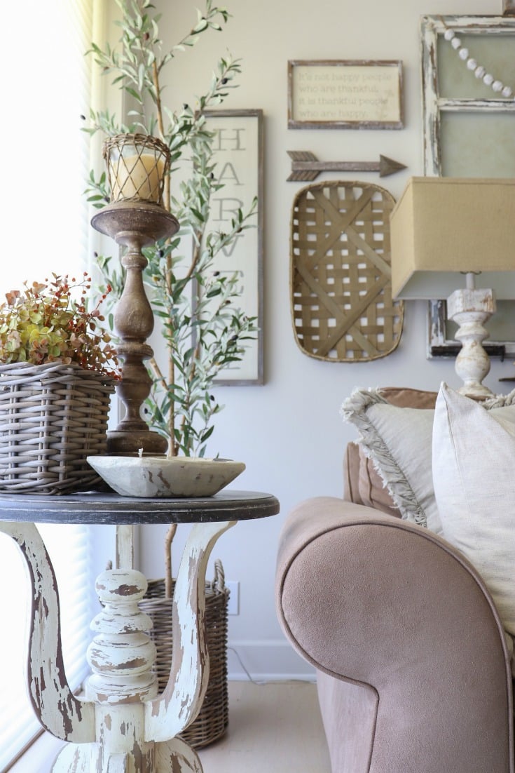 Neutral details, and a collection of textures add warmth to this farmhouse fall family room decor