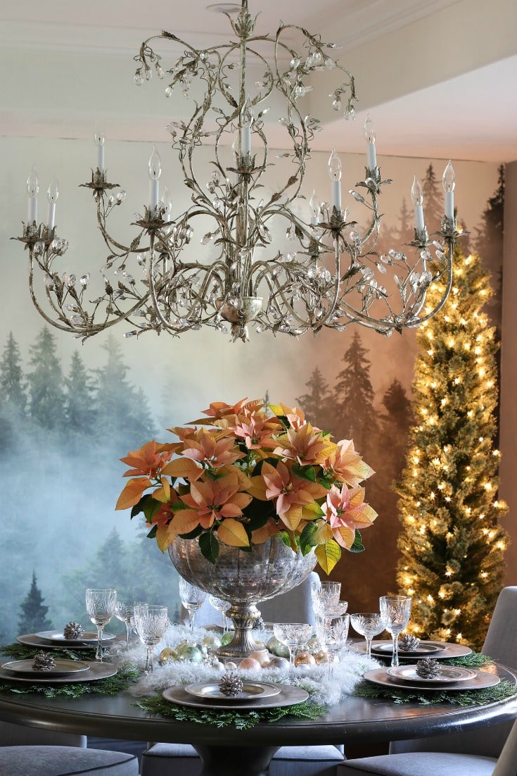 natural dining room decor with elegant crystal chandelier and greenery