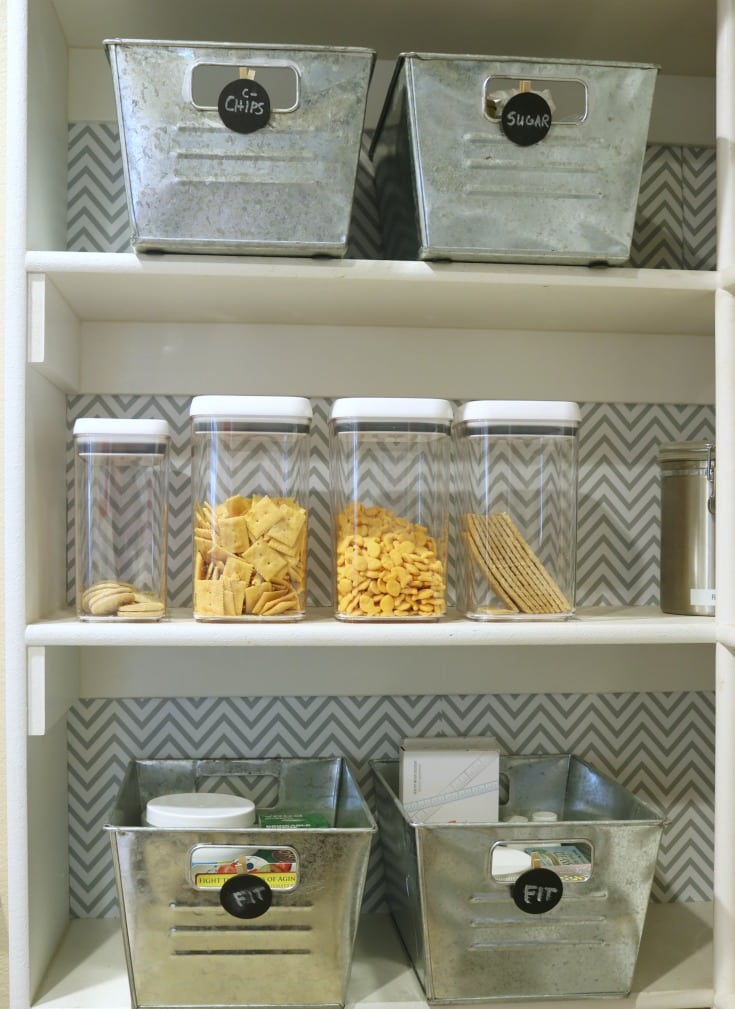 clear food containers with pasta in walk-in pantry