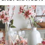 dining room table decorated with pink florals