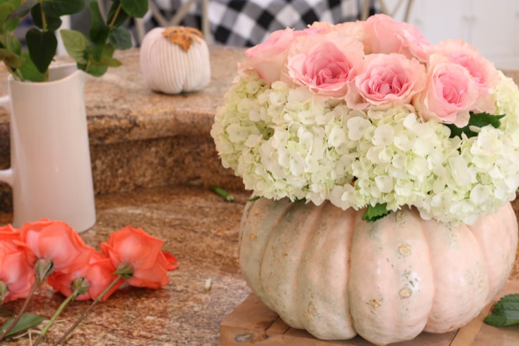 Step by step creating the pumpkin floral arrangement with roses