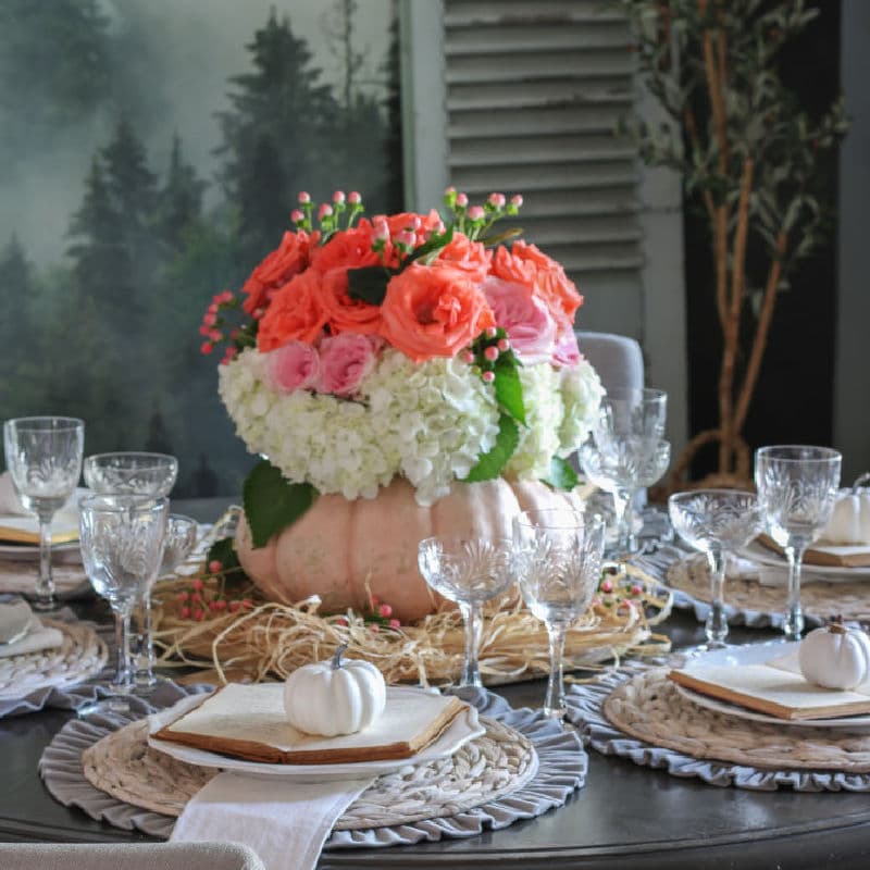 easy DIY pumpkin floral vase center piece in dining room
