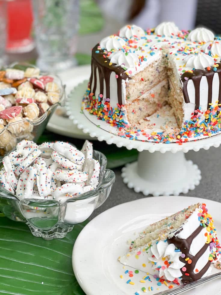backyard party is complete with party cake and festive treats