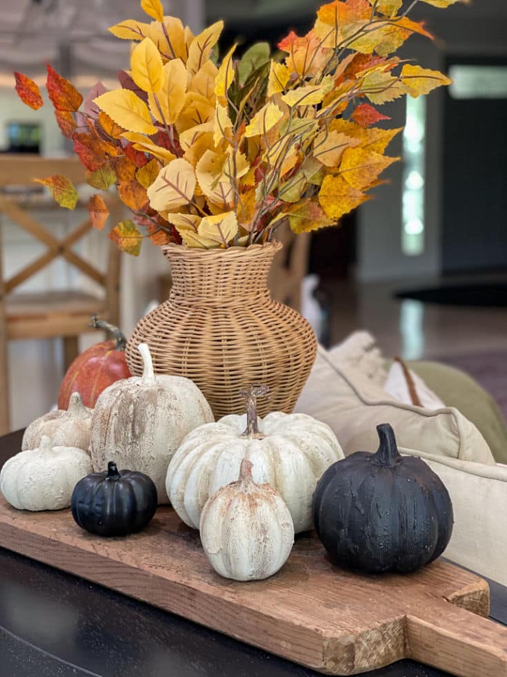 Fall decor created with fall pumpkins in different neutral colors