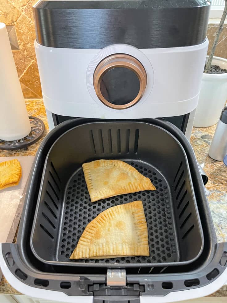 easy 6 min homemade air fryer pop tarts look delicious and golden brown in air fryer basket