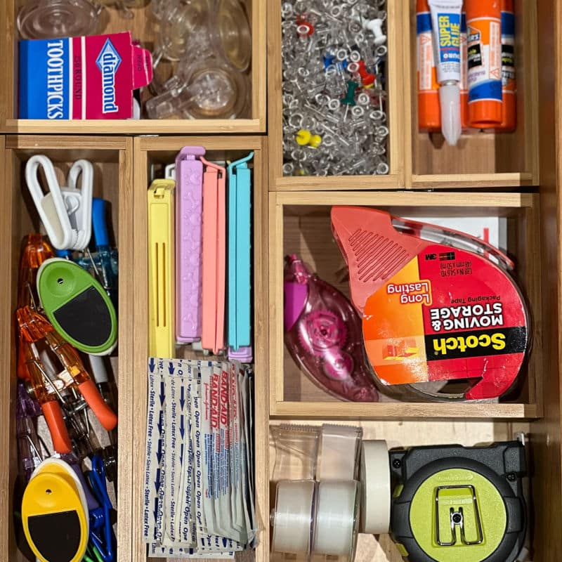 after photo of misc drawer organized with bamboo boxes