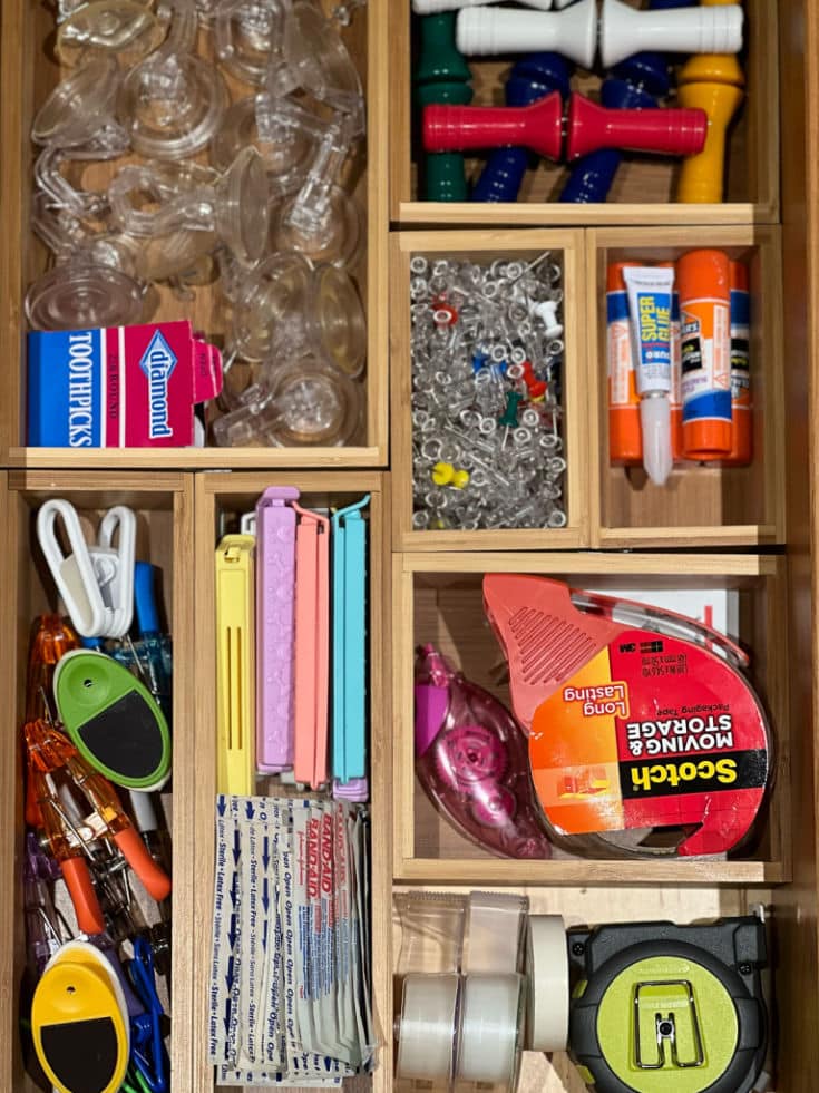 After photo of miscellaneous items organized with bamboo drawer boxes.