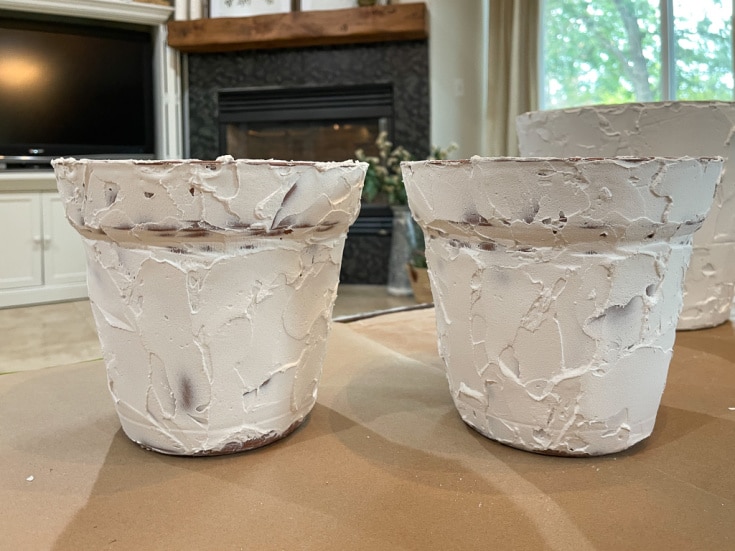 plastic pots after joint compound texture has dried