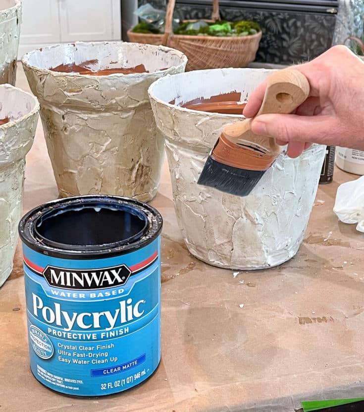 Adding polycrylic top coat to seal faux stone planter finish
