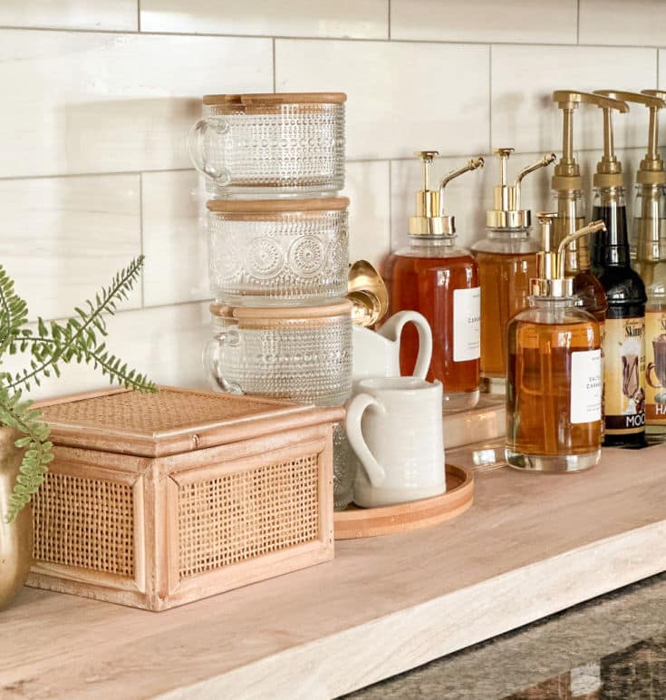 Marble backsplash and built-in cabinets perfect for DIY Coffee Station
